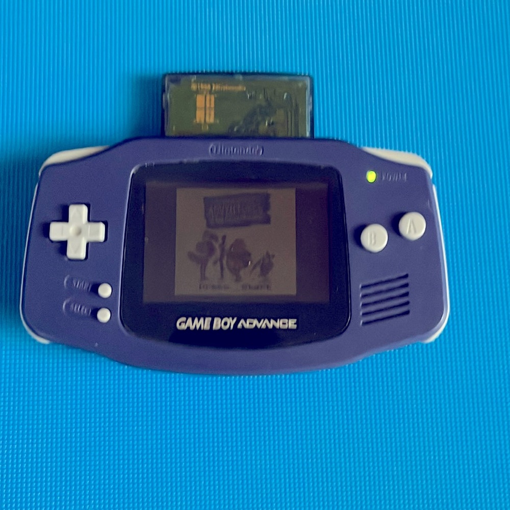GAME BOY ADVANCE.  PURPLE. BATTERY COVER MISSING.  POOH GAME included